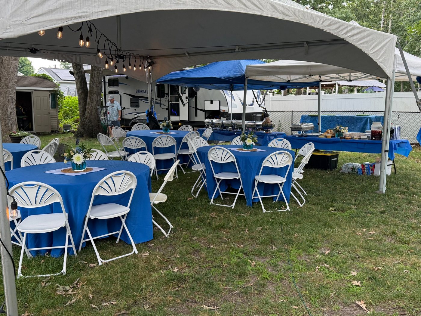 Graduation party tent seating and buffet area